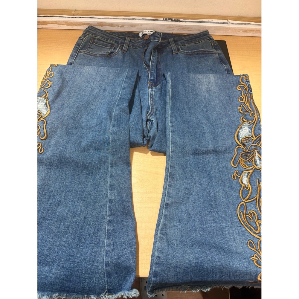 Fashion Nova Embroidered Flare Jeans Medium Wash Distressed Raw Hem Size 11 - Picture 1 of 6